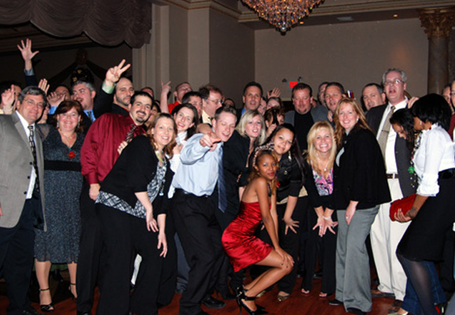 We celebrate at the end of each year with our huge Holiday Party.